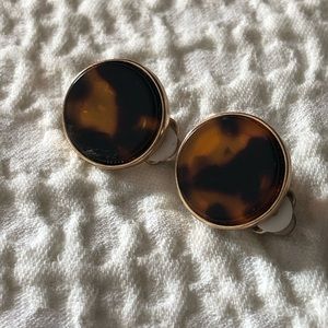 Pair of clip on tortoise button earrings